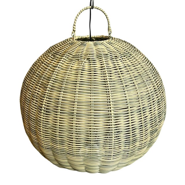 Beautiful outdoor/ indoor faux rattan globe lantern. Hand woven synthetic rattan with a natural wicker appearance. Rust-...