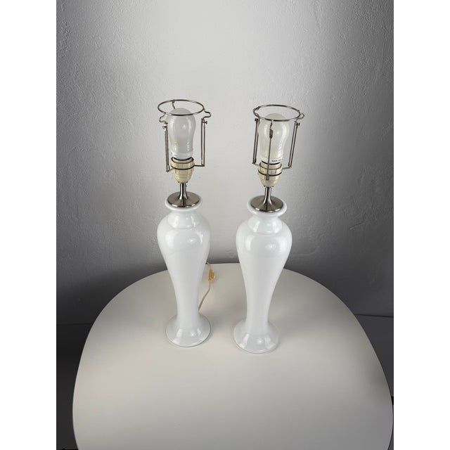 Elegant pair of original royal copenhagen table lamps, model napoli mellem, type ac 110 b. the lamps are made from...