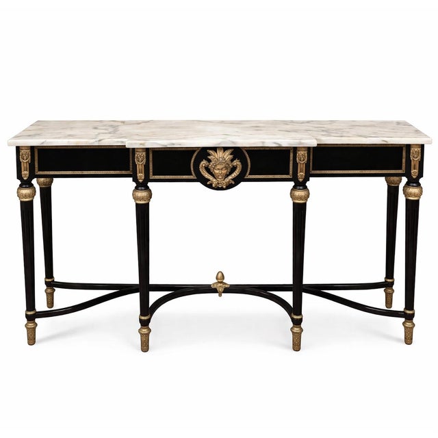 Elegant French Empire / Neoclassical style console table featuring a classic black lacquer finish with striking gold...