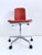 One height-adjustable, swivel desk chair, designed by Frederick Scott for Hille, England. The chair has casters and a tilt...
