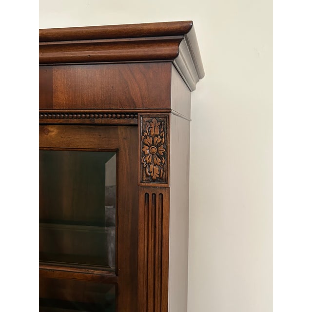 Beautiful Ethan Allen Ashton Curio Cabinet in excellent condition, featuring rich traditional styling, exceptional...