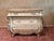 Elegant vintage bombe-style dresser featuring dramatic French Provincial / Hollywood Regency styling with a beautifully...