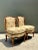 This pair of vintage slipper chairs channels mid-century design at its most refined, pairing a sculptural wood frame with...