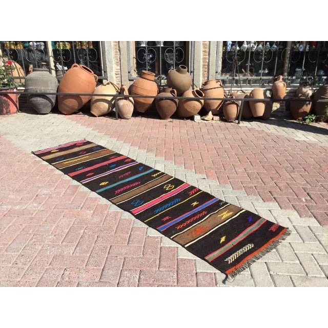 This beautiful, vintage, handwoven kilim is approximately 60 years old. It is handmade, of very fine quality hand spun...