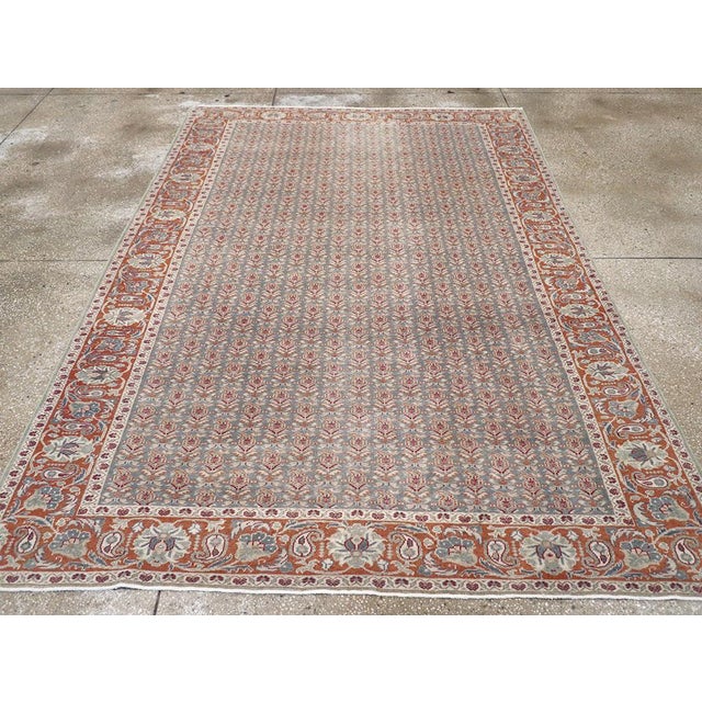 A vintage Turkish Sivas accent rug handmade during the Mid-20th century. Measures: 6' 7" x 9' 5"