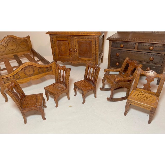 Up for sale is a wonderful antique hand carved Tramp Art miniature bedroom furniture set. The set is completely made by...
