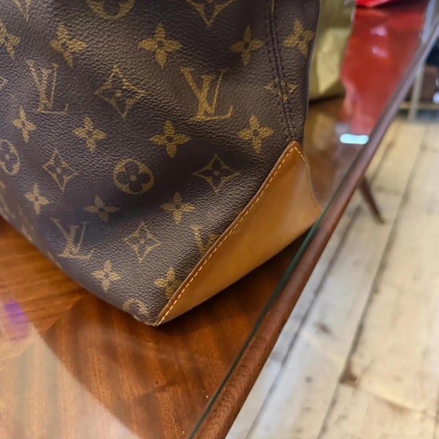 This authentic Louis Vuitton Luco tote bag is a classic, structured everyday piece meticulously crafted from the house's...