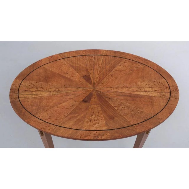 Very nice Antique France center table in a oval shape. Nut and burl wood Star shape inlay. Nice bronze ormolu mounts....
