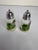 Beautiful vintage frosted glass condiment and serving set featuring hand-painted green leaf motifs. This charming set...