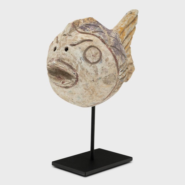 Hand-carved from reclaimed wood, this colorful koi fish is a traditional symbol of harmony, wealth and luck. The rustic...