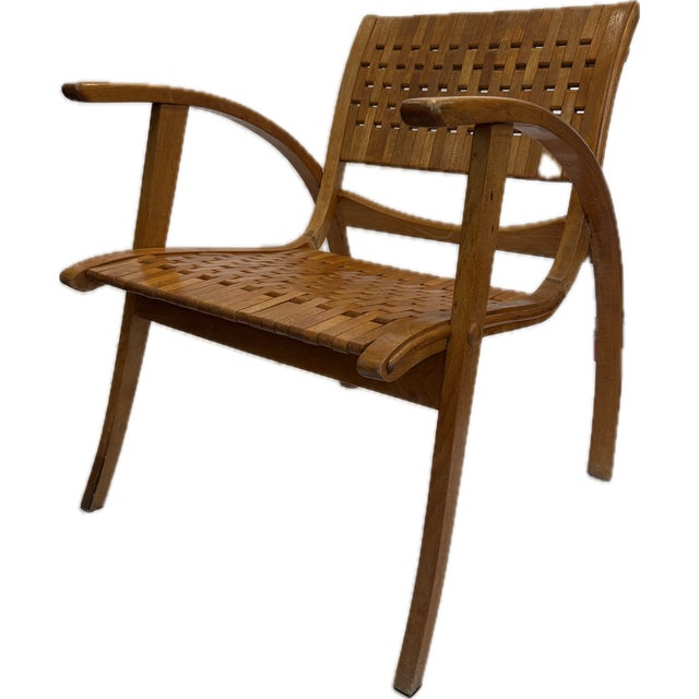 Vintage “gelenka” cantilever armchair, model 117, produced in germany in the 1950s. The chair features the characteristic...