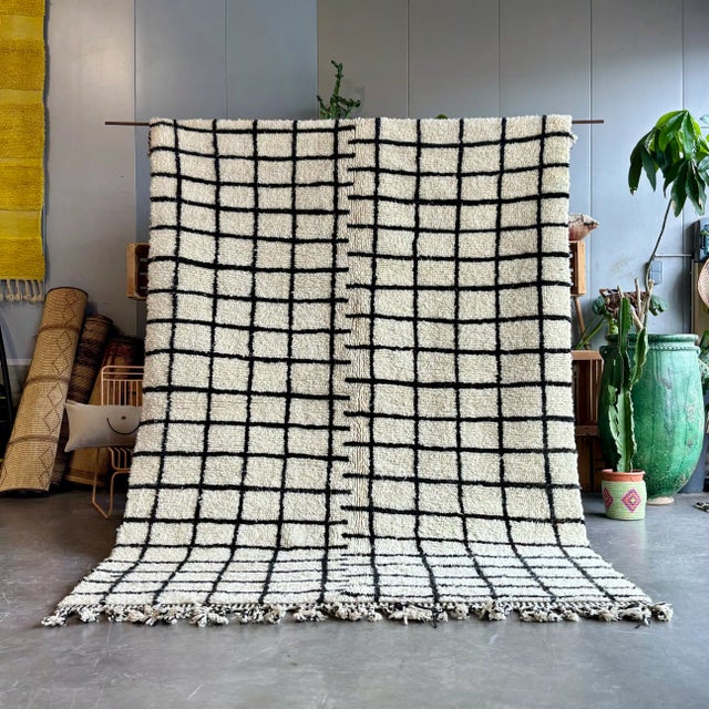 Enhance your living space with this exquisite Vintage Modern Moroccan Berber Rug, showcasing a unique geometric design....