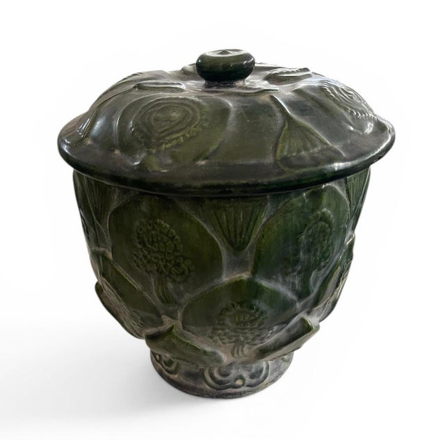 Add a touch of organic sophistication to your space with this substantial vintage ceramic lidded jar. Designed with a...