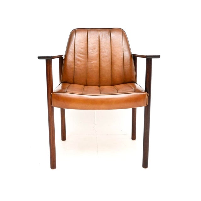 A beautiful and extremely comfortable vintage leather armchair / desk chair by Sven Ivar Dysthe for Dokka Mobler. This was...