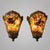 This spectacular pair of wall sconces embodies the exuberance and craftsmanship of Murano's master glassmakers in the...