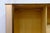 A pair of Italian Art Deco cabinets attributed to Paolo Buffa, Italy, circa 1940s. The cabinets feature a blonde wood...