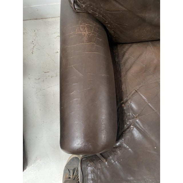 Pair of vintage leather armchairs from the 1970s seat with removable cushion a tear on the right armrest otherwise in good...
