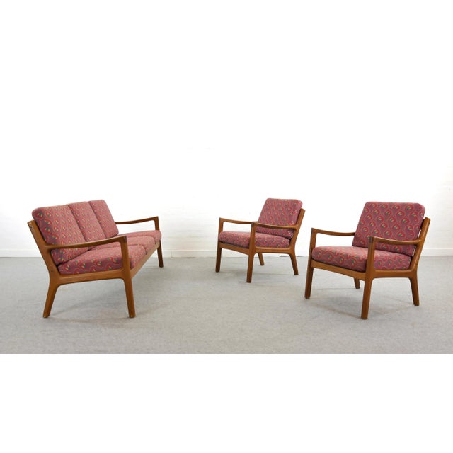 Senator series set from ole wanscher ca 1960. 2 armchairs with armrests and 3-seater sofa in teak, all marked with...