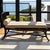 An elegant Klismos-inspired chaise lounge combining classical curves with the clean, sculptural appeal of mid-century...
