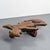 Large, free-form coffee table crafted from a single, imposing piece of elm burl, circa 1960. The tabletop retains the...