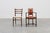 A charming late‑19th‑century French chair in the Louis XIII style, featuring a solid wooden frame with turned legs and arm...