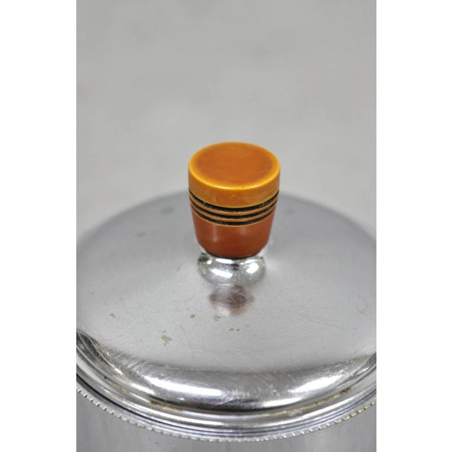 Vintage Art Deco Krome Kraf Farber Bros Silver Plated Sugar Bowl with Bakelite Handle. Circa Mid 20th Century....