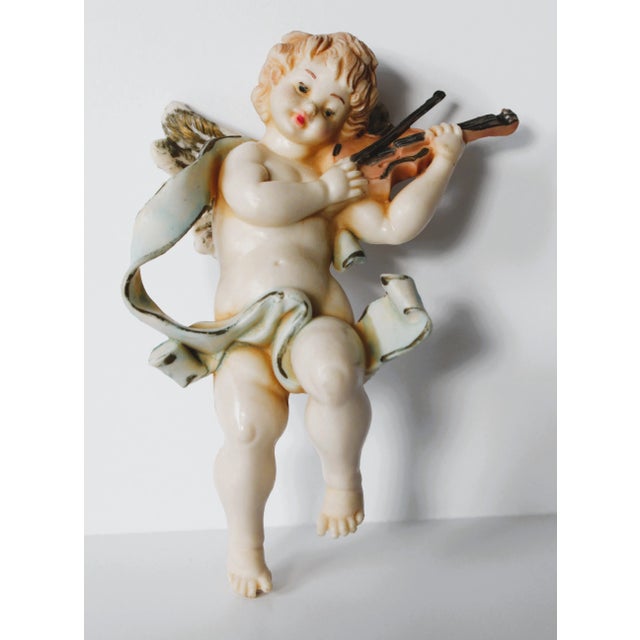 Figurative set of three antique Italian Cherub Christmas ornaments. "Made in Italy"