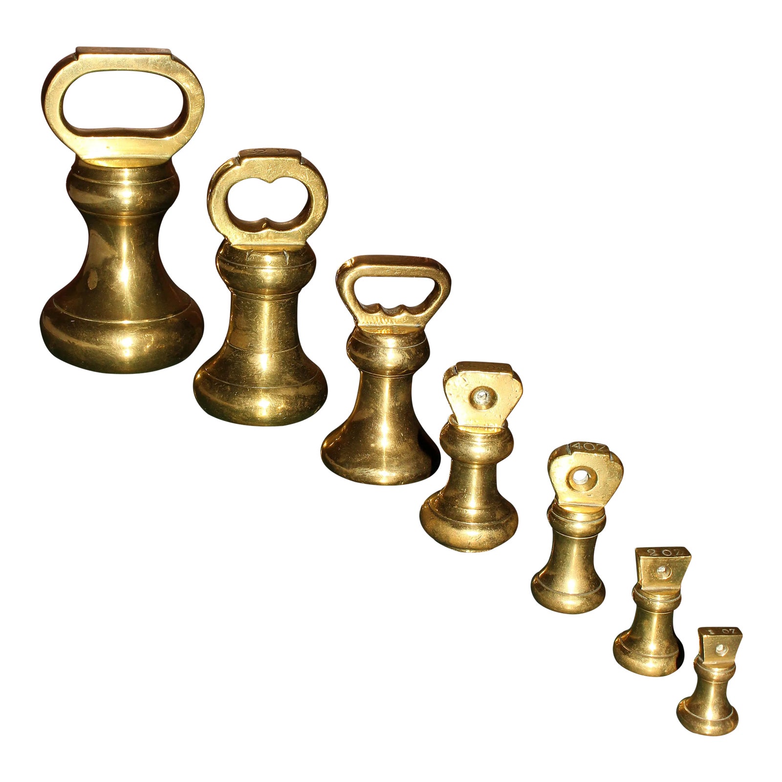 Brass Bell Form Weights Set of 7 Chairish