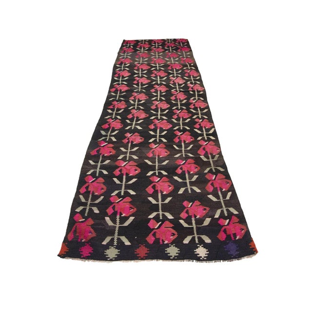 Vintage handwoven decorative kilim rug from Kars region of Turkey. Approximately 50-60 years old. In very good condition.