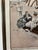 Vintage Harrison Fisher “Picnic at the Beach” print, dated 1903. A charming seaside scene with a group gathered for a...