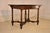 19th century inlaid walnut writing table/desk from France. The top is made from two gorgeous walnut boards, surrounded in...