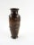 Circa 1900 Meiji period bronze and copper mixed metal small Japanese vase. Bronze body, applied high relief copper stork...