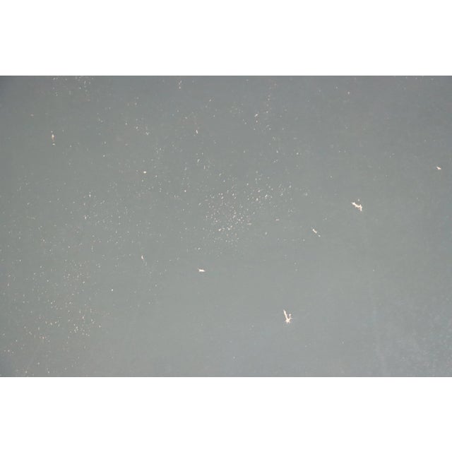 Mid Century Ottoman by Classic leather with nailhead trim.