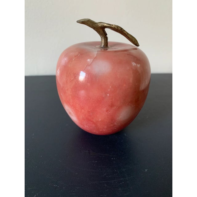 Marble apple paper weight or decorative accessory featuring of deep pink and cranberry tones . A gorgeous addition to your...