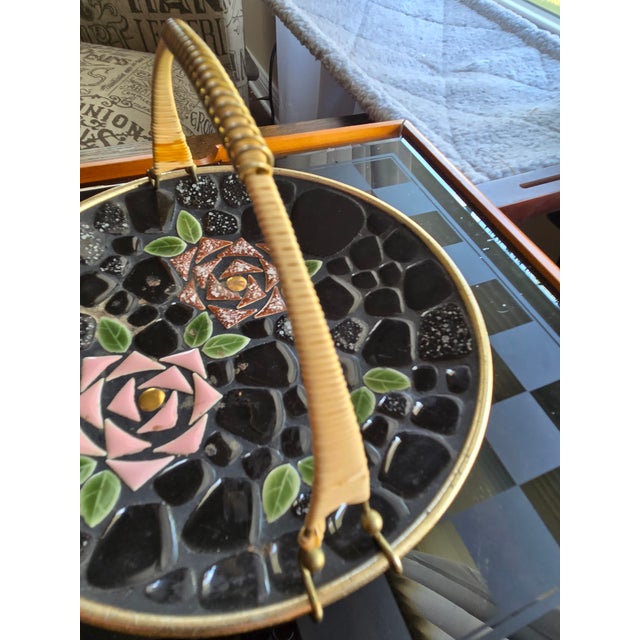 Vintage mosaic tile or trivet tray. Made in the 50's or early 60's. this black background features pink roses is a...