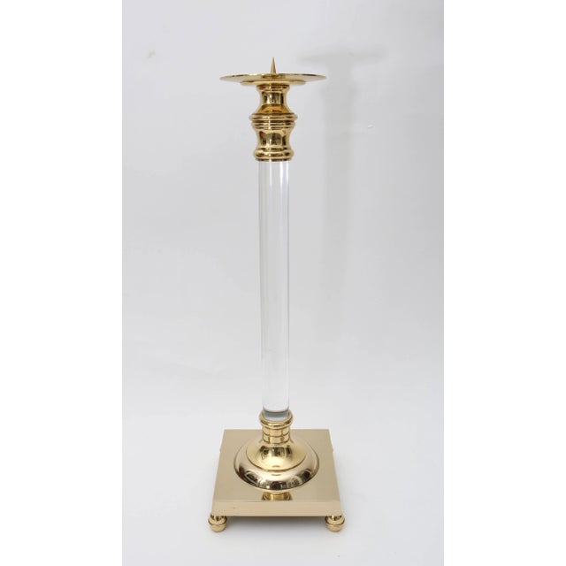 This stylish three-piece set of Lucite and brass candle sticks have recently been professionally polished and lacquered....