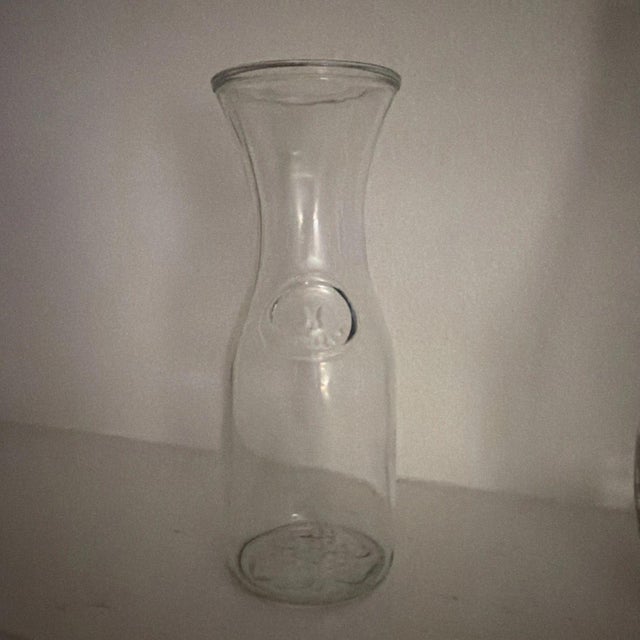 This set includes three clear glass wine decanters of various sizes. Made of glass, these decanters are perfect for...