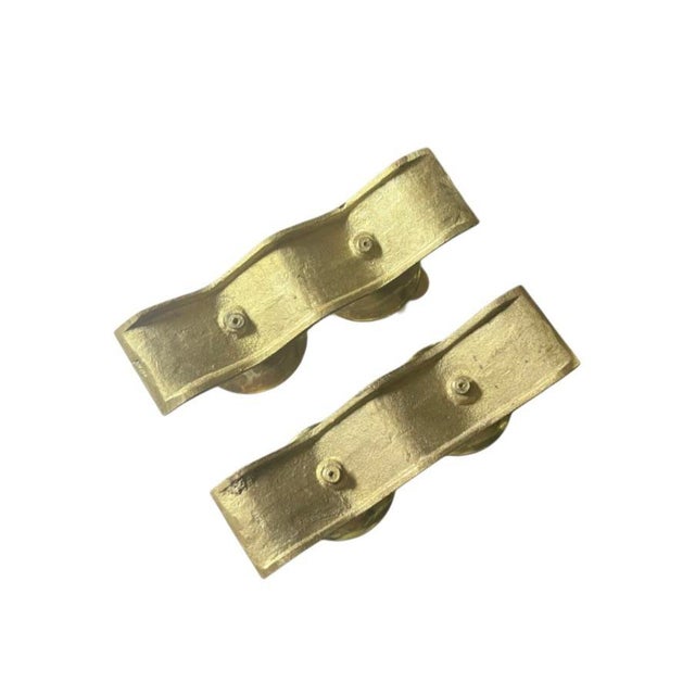 Wonderful set of brass Scandinavian style candle holders! Features a beautiful patina and holds two tapered candles in...