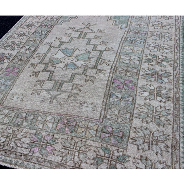 Mid 20th Century Tribal Vintage Turkish Oushak Square Rug With Medallion in Soft Green and Creams For Sale - Image 5 of 11