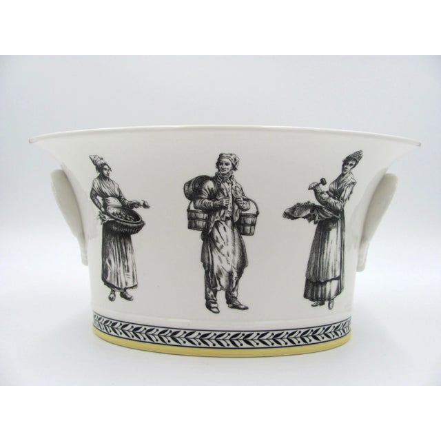 No chips nor cracks nor crazing Colors and glossy glaze are vibrant and crisp Discolored scuffing on underside bottom...