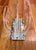 Lucite and chrome magazine rack or record organizer featuring five graduated acrylic arches mounted to a polished chrome...