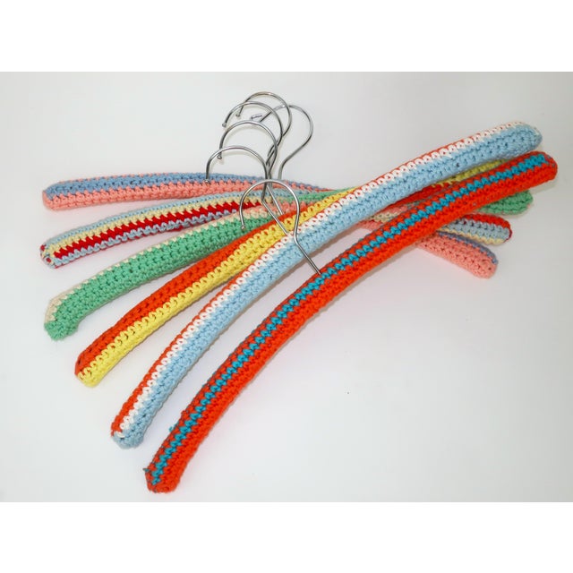 Set of 6 handmade colorful crochet covered wood hangers in a cottagecore style perfect for adding a little charm to your...