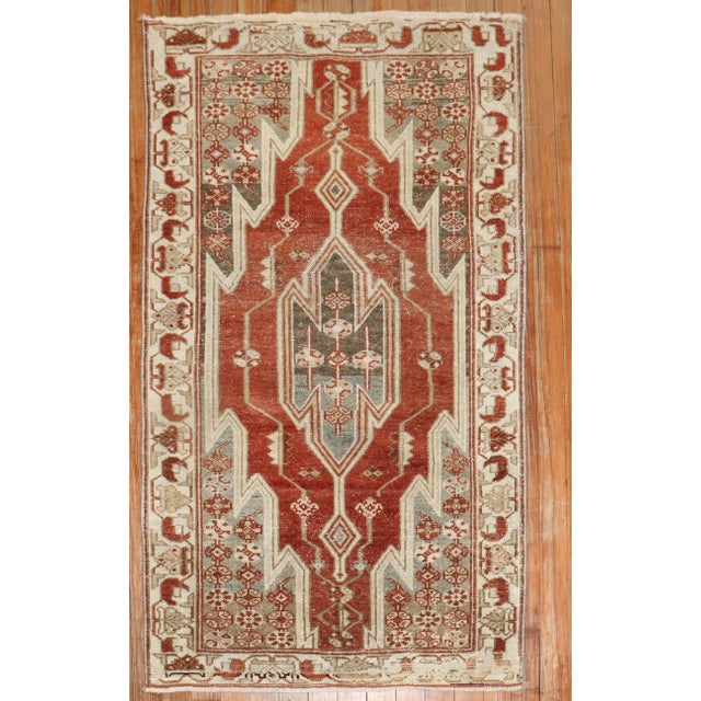 A small Size early 20th century Persian Malayer mazlagan rug in red, gray, ivory nad brown Size 2' 6" x 4' 2" (76 x 127 cm).