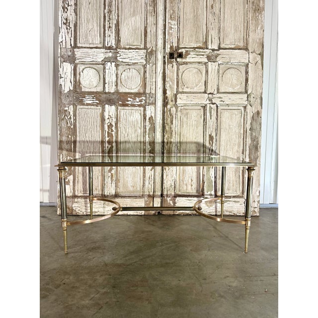 Small bronze coffee table attributed to charles & fils, circa 1960. It has a double patina (some wear to the brown...