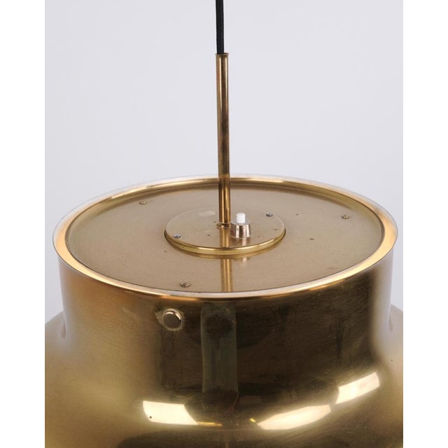 Bumling ceiling lamp in brass designed by Anders Pehrson, Sweden, 1960s. Classic Scandinavian lamp with a simple and...