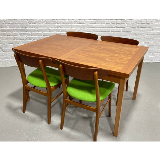 Mid Century Modern Teak Dining Table Hidden Leaves, Made in Denmark