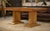 Beautiful oak table from the 1940s, in the late Art Deco style. Its top features a checkerboard marquetry/parquet-like...