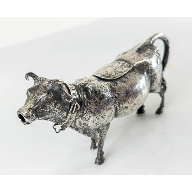 We are selling this exceptionally finely detailed Creamer in the shape of a cow. The creamer is heavily detailed with...