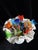 ​A striking 12-piece decorative centerpiece set featuring an authentic vintage Fenton white milk glass hobnail ruffled...