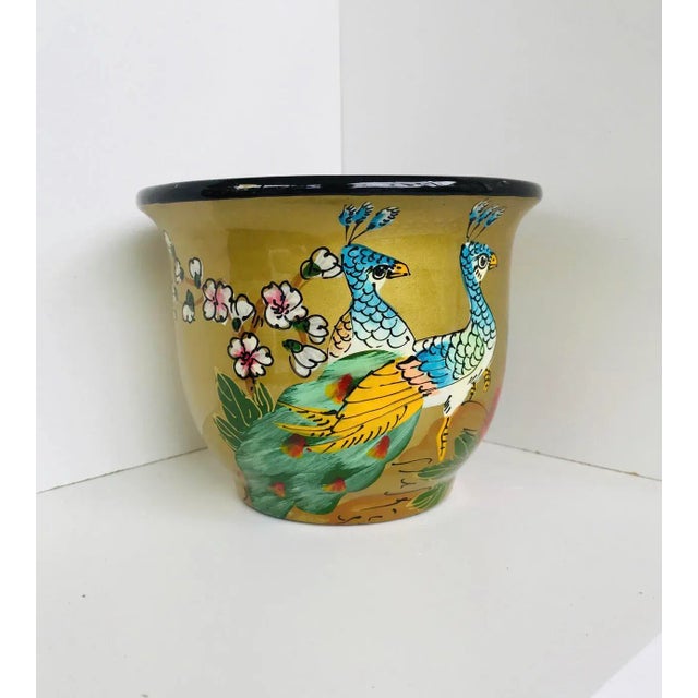 Vintage Chinese small planter / cache-pot with beautiful painted Peacocks birds and flowers scene. Has a drain hole on the...